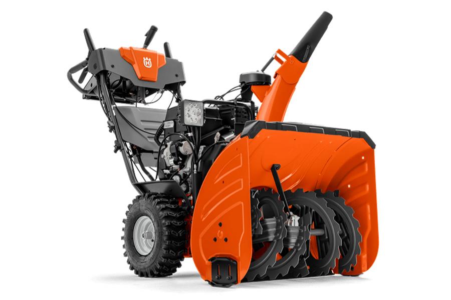 Husqvarna ST 430 lumilinko edestä kuvattuna – tehokas kaksivaiheinen lumilinko talvikunnossapitoon
