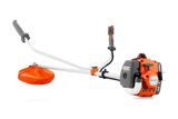 Husqvarna 122R ruohoraivuri trimmeripäällä