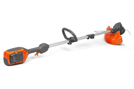Husqvarna 215il akkutrimmeri sis. akku ja laturi